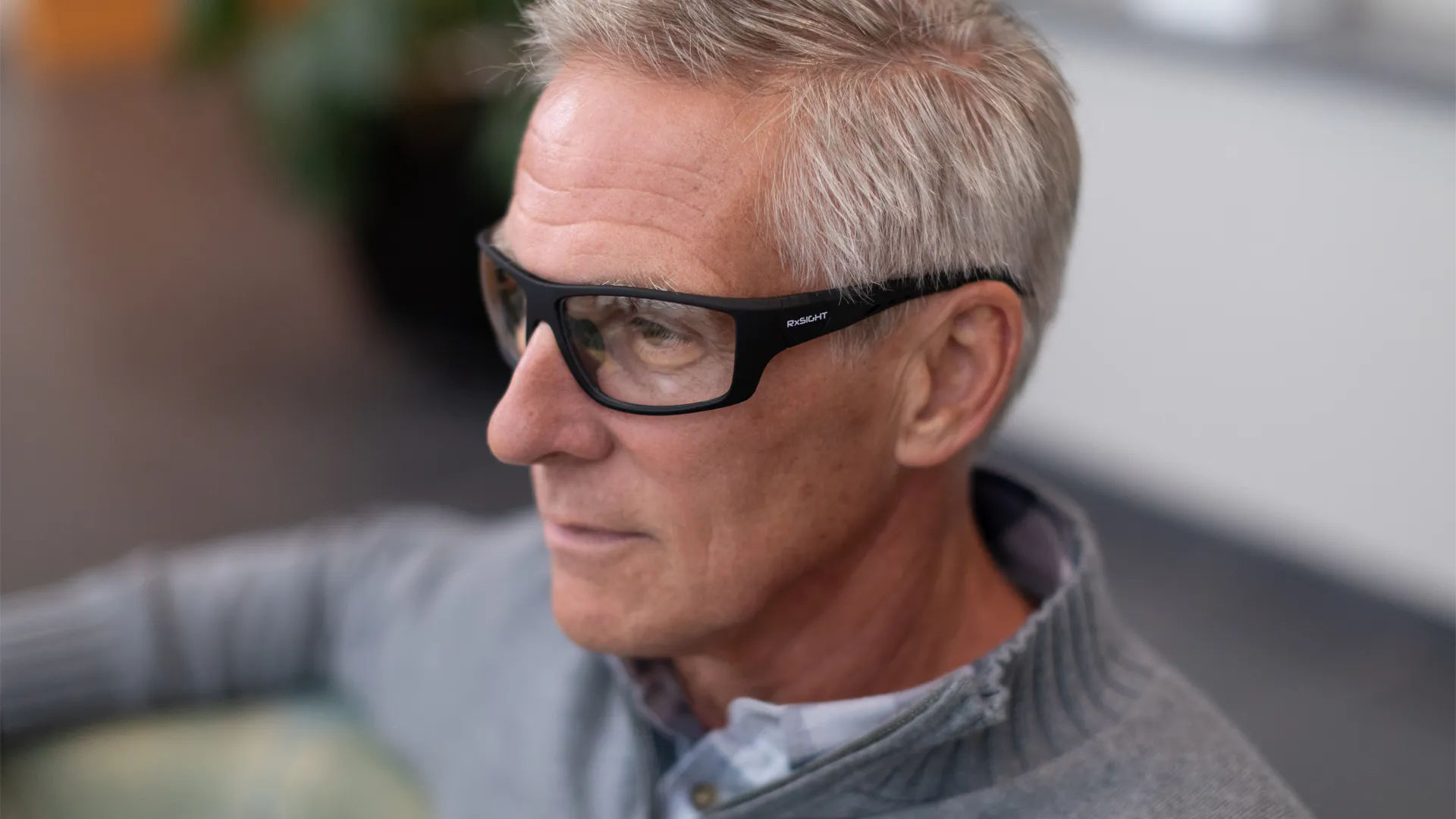 Light Adjustable Lens patient wearing the RxSight UV-protective glasses